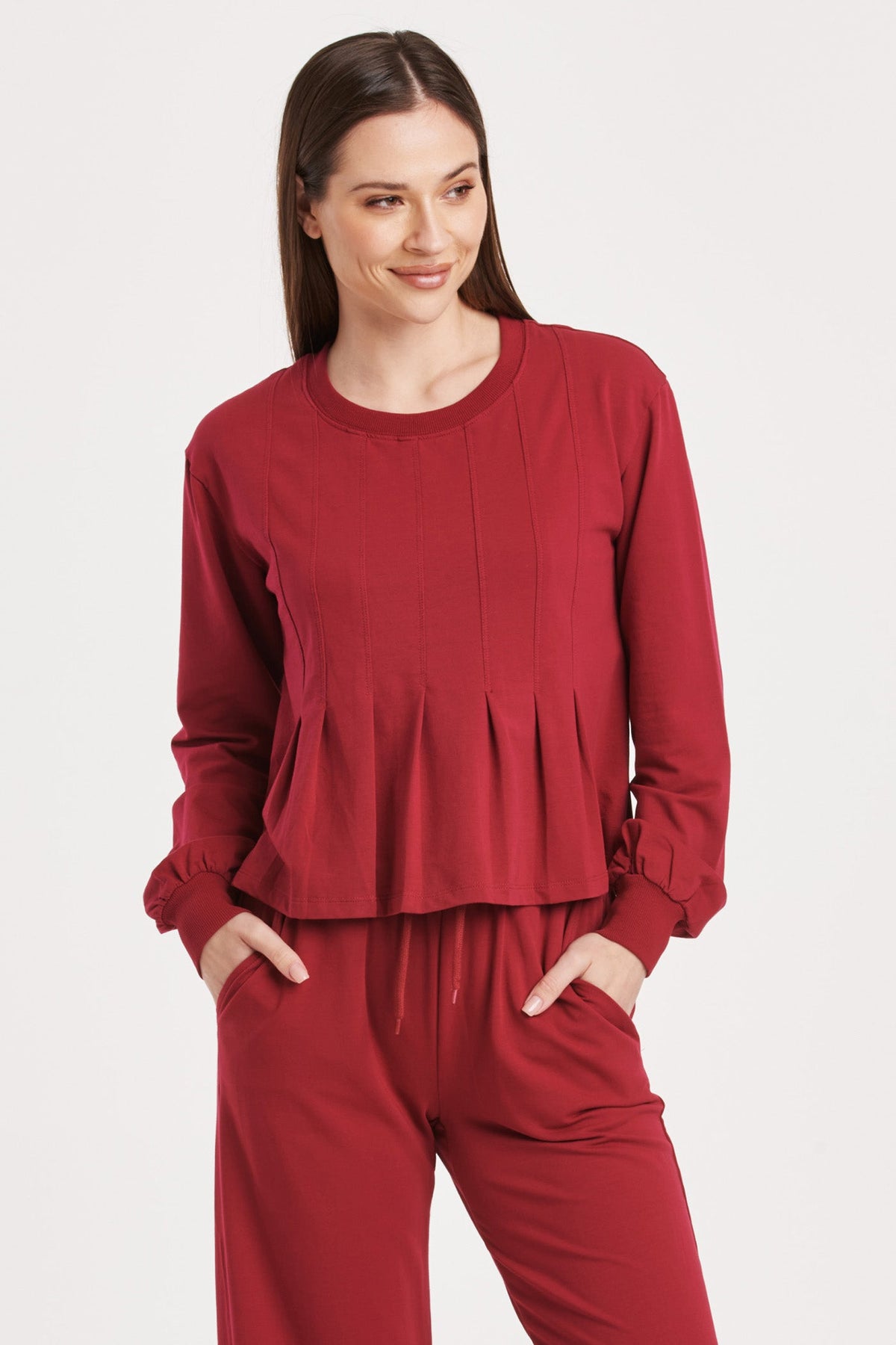 dove-long-sleeve-pleated-peplum-top-granada