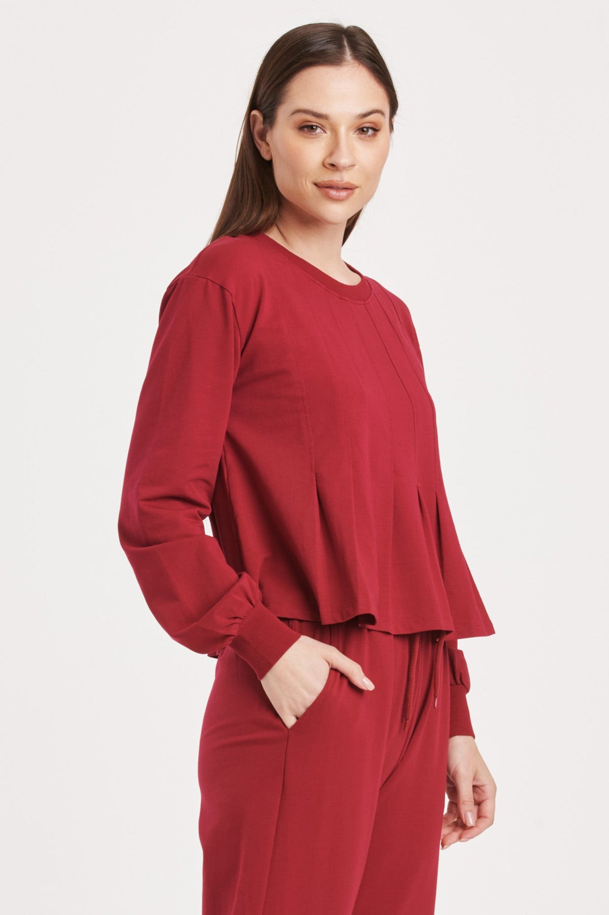 dove-long-sleeve-pleated-peplum-top-granada